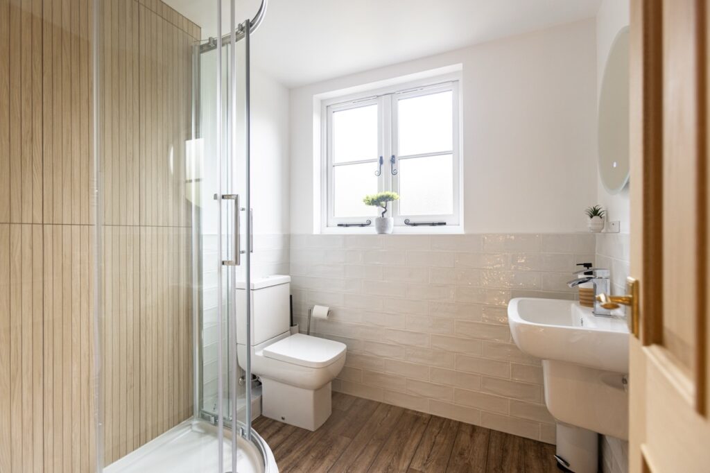 refurbed bathroom with monkey tail windows