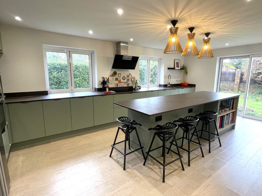 green kitchen with dark counters