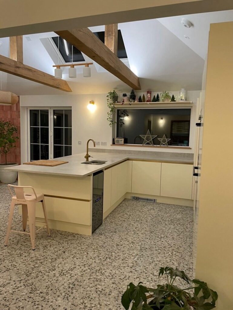 white kitchen with pitched roof