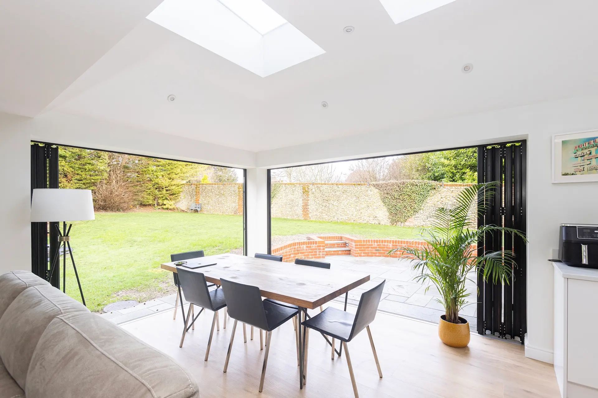 large new dining area with bifold doors into the garden area