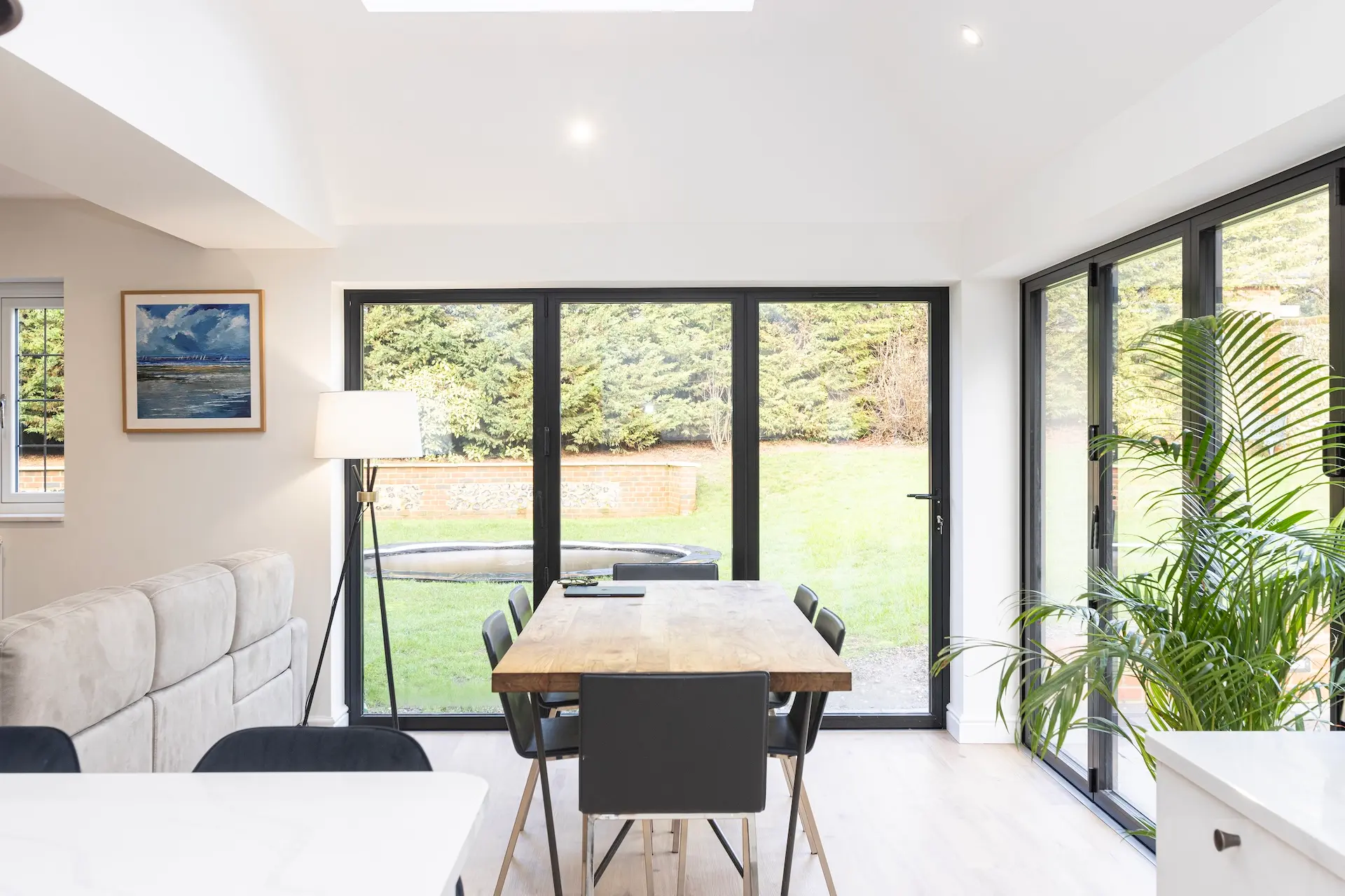 dining area in a new extension with bifold doors