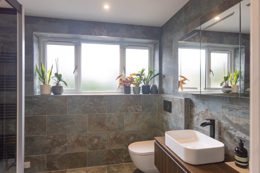 ensuite with stone tiles