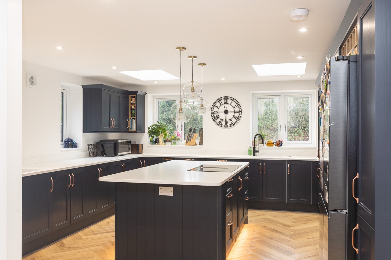 navy kitchen with skylight renovation